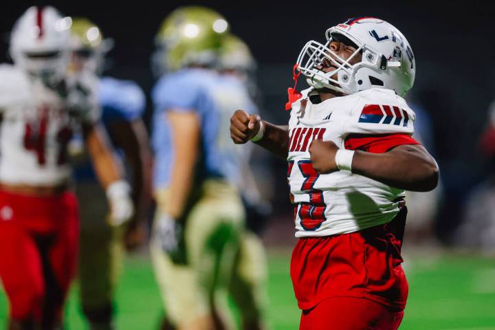 Liberty defensive end Jonathan Ioane celebrates during a high school football game between Libe ...