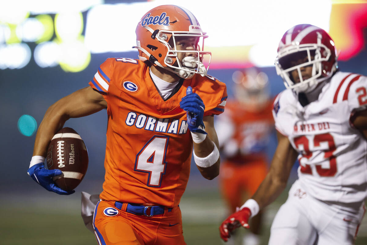 Bishop Gorman wide receiver Kaina Watson (4) makes a catch and run past Mater Dei cornerback My ...