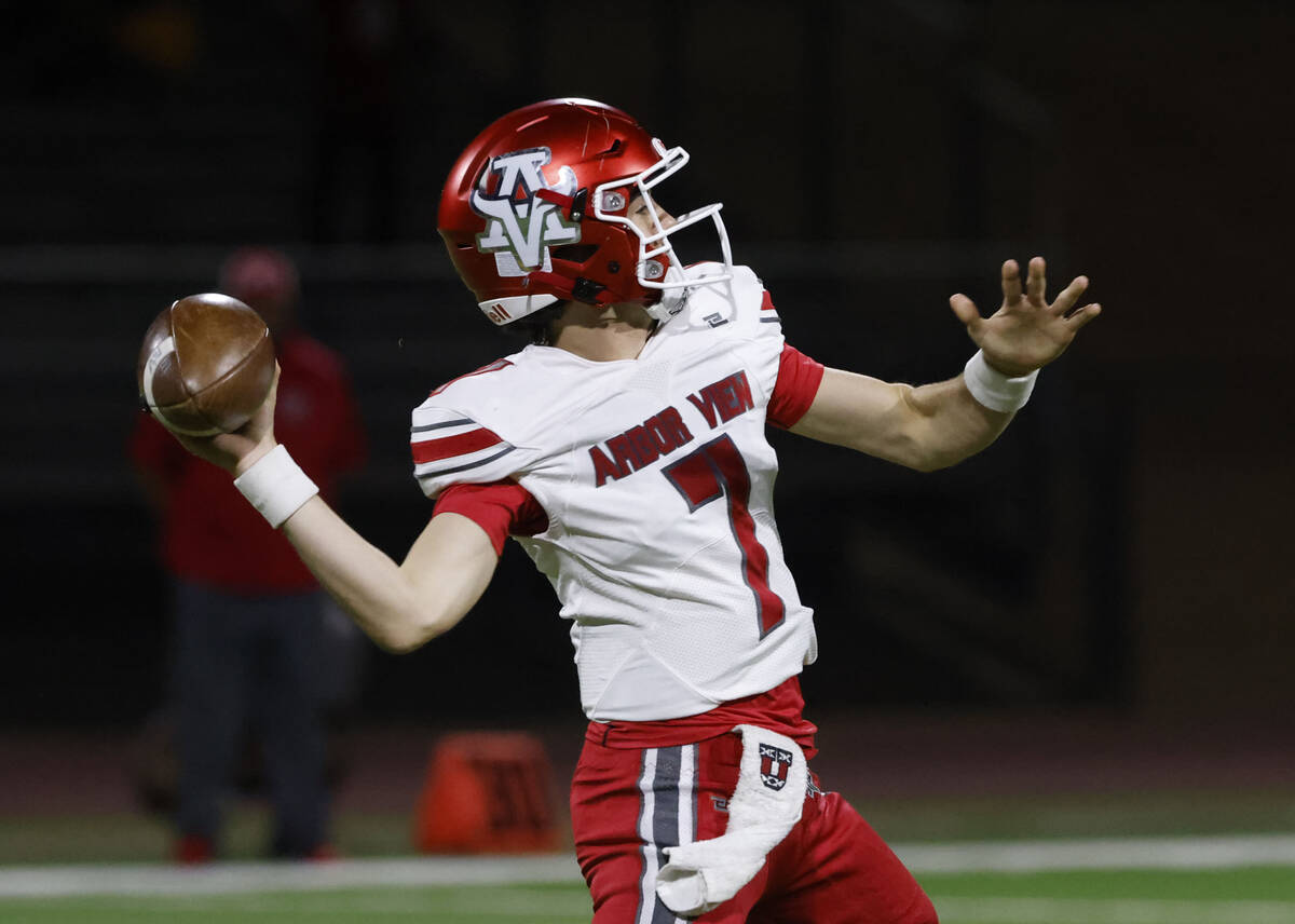 Arbor View's quarterback Thaddeus Thatcher (7) throws a touchdown pass against Las Vegas H ...