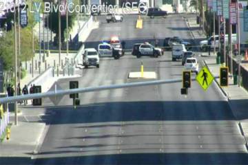 Police block off streets around Convention Center Drive and Paradise Road on Thursday, Nov. 13, ...