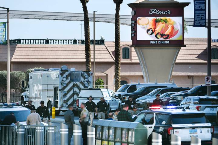 Las Vegas police investigate the area around Piero’s restaurant after an explosive devic ...