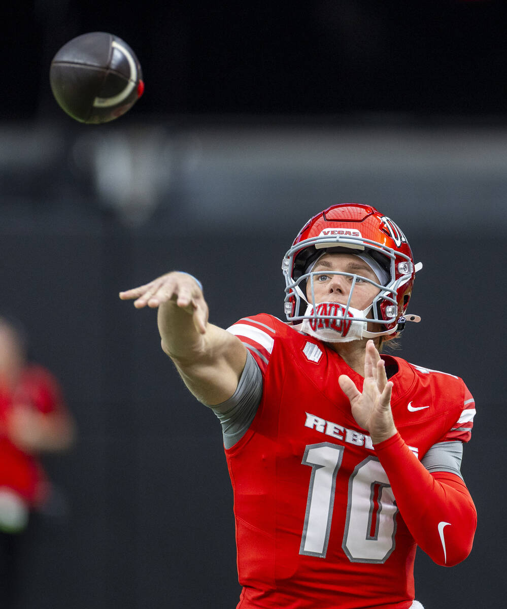 UNLV quarterback Anthony Colandrea (10) gets off a pass against the New Mexico Lobos during the ...