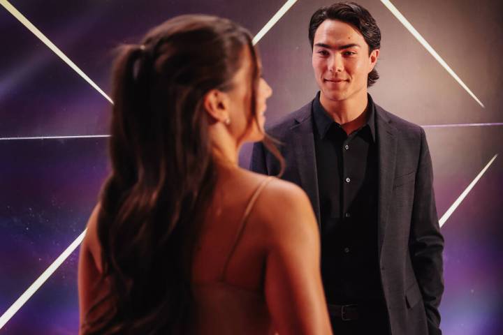 Bryan Woo looks at his girlfriend, Clare Giatzis, on the MLB Awards red carpet at The Cosmopoli ...