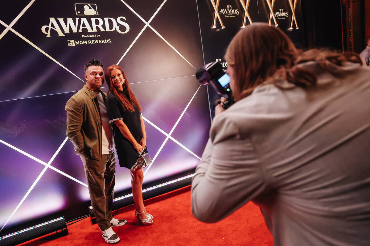 Nick Swisher walks the MLB Awards red carpet with his wife, JoAnna Garcia Swisher, at The Cosmo ...