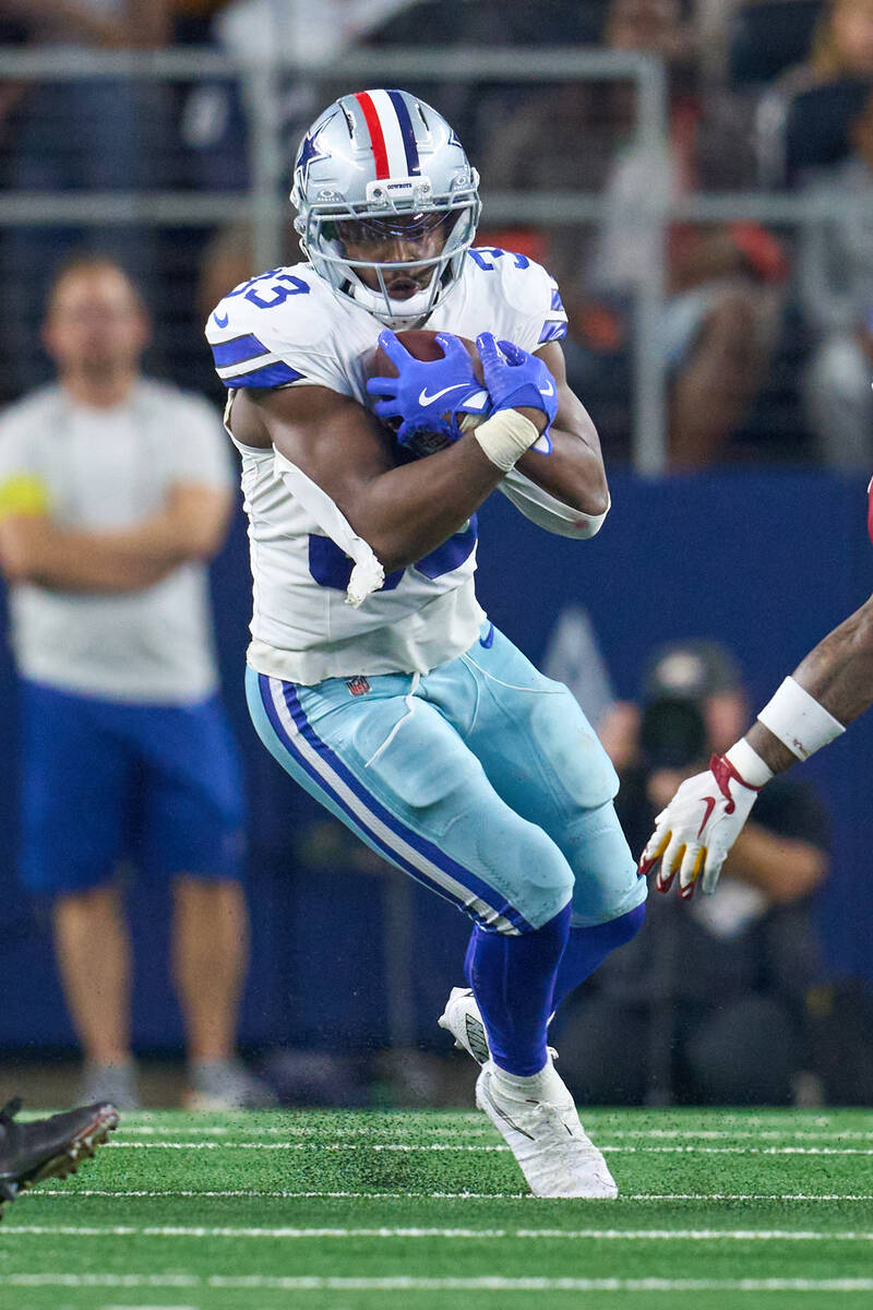 Dallas Cowboys running back Javonte Williams (33) runs the ball during an NFL football game bet ...