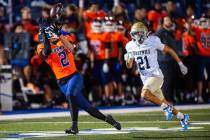 Bishop Gorman wide receiver Zyren Menor catches the ball during a Open Division high school fo ...