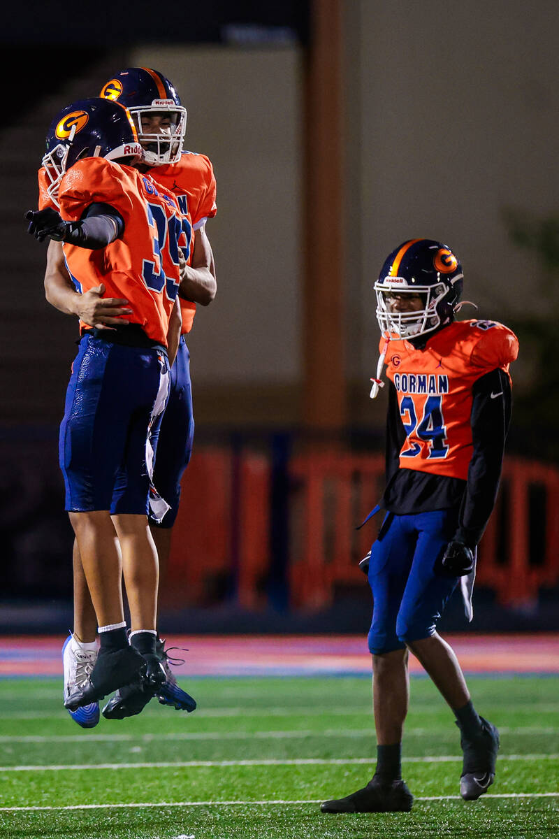 Bishop Gorman players celebrate during a Open Division high school football playoff game betwee ...