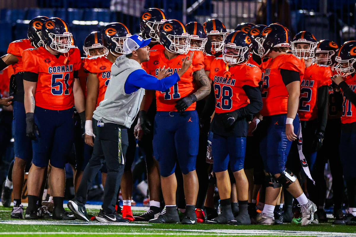 Bishop Gorman head coach Brent Browner directs his team during a Open Division high school foot ...