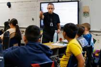 Roger Becker, a fifth-grade math teacher at Richard Bryan Elementary School, teaches on Tuesday ...