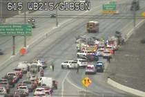 A crash is investigated Friday, Nov. 14, 2025, on westbound 215 Southern Beltway at Gibson Road ...