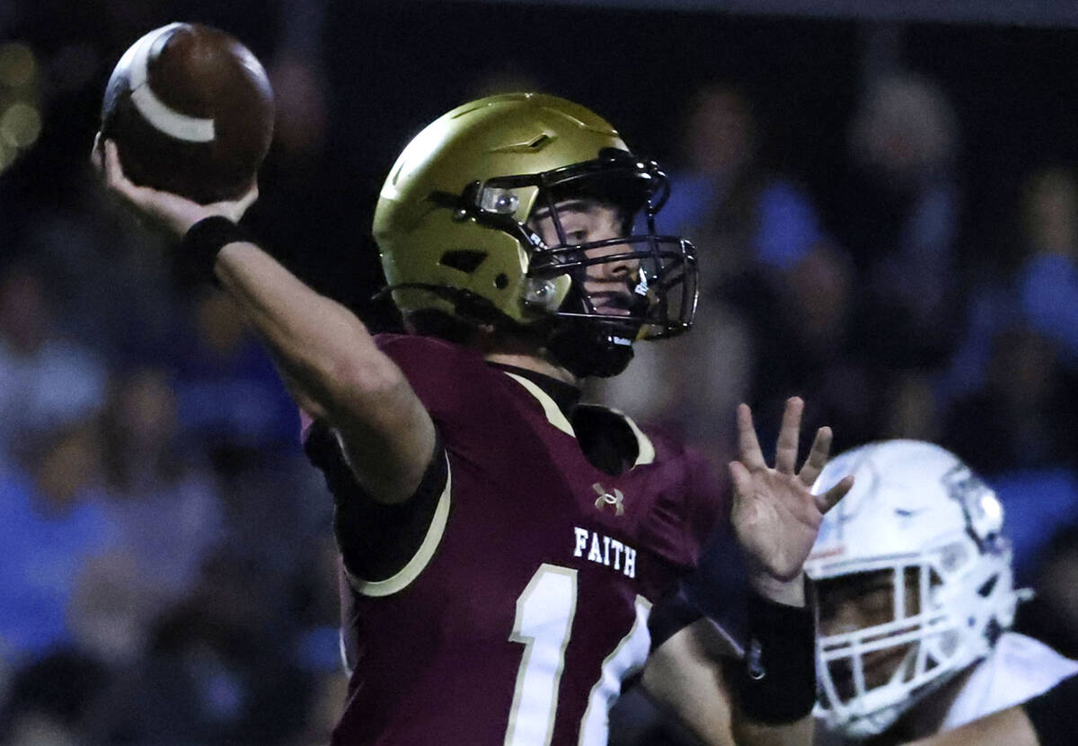 Faith Lutheran quarterback Dominick Folino (14) throws a pass against Centennial during a Class ...