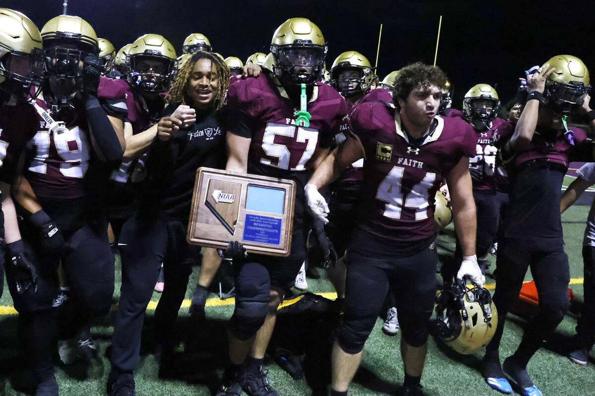 Faith Lutheran players celebrate after defeating Centennial in a Class 5A Southern Region title ...