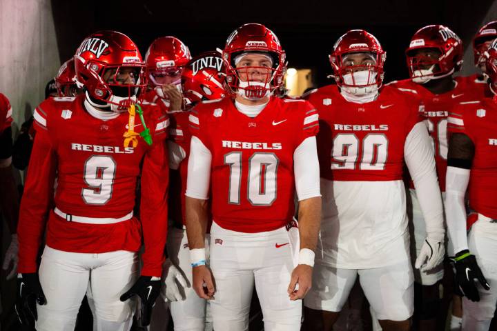 UNLV football team prepare to enter the field against the Colorado State Rams prior to the firs ...