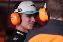 McLaren driver Lando Norris of Britain stands in the pit during a practice session for the Braz ...