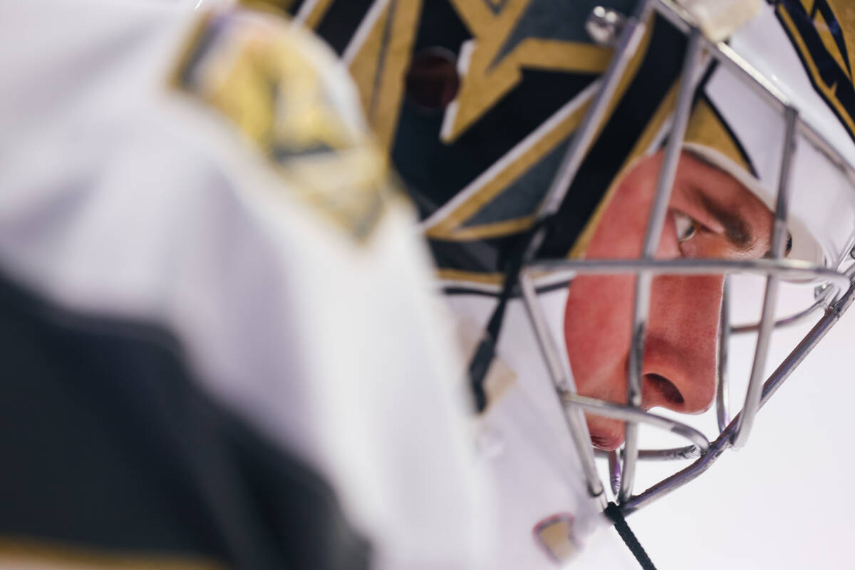 Goaltender Carter Hart warms up before the Silver Knights’ game against the Calgary Wran ...