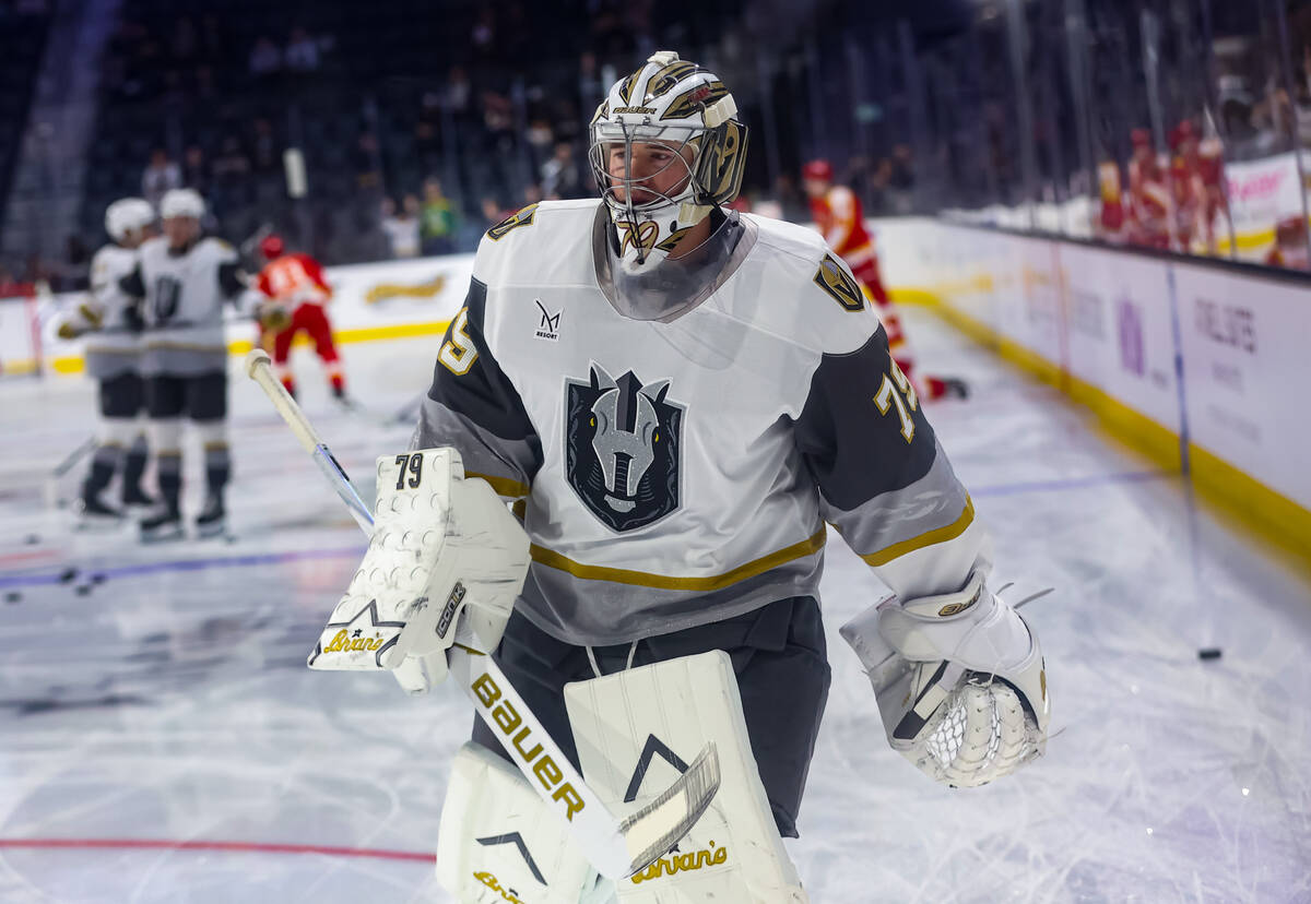 Silver Knights goaltender Carter Hart (79) warms up before an AHL hockey game against the Calga ...
