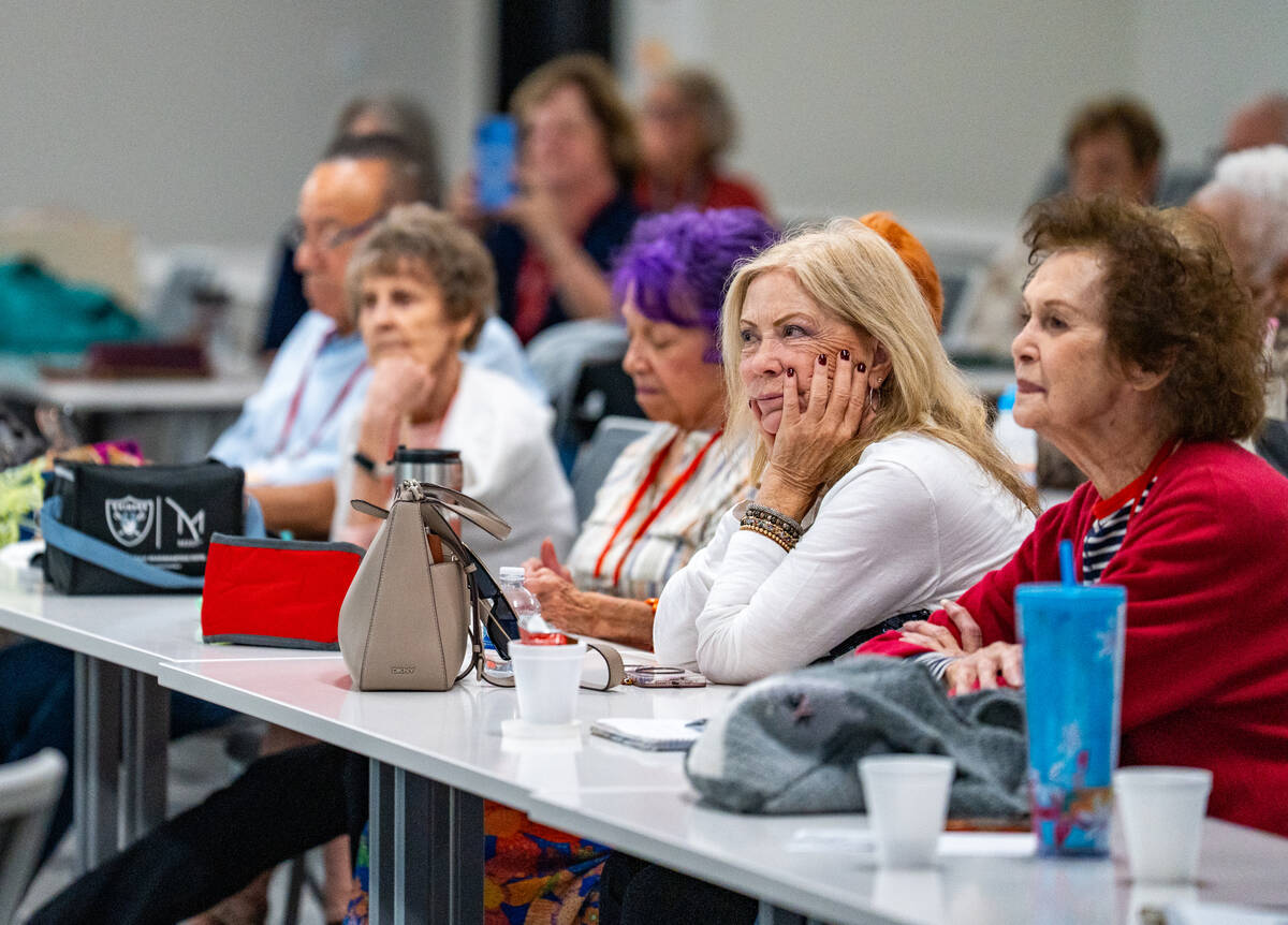 Members listen as local musician Patrick Hogan performs during a “Jazz Appreciation&#x20 ...