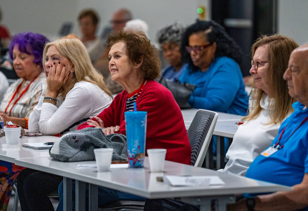 Members listen as local musician Patrick Hogan performs during a “Jazz Appreciation&#x20 ...