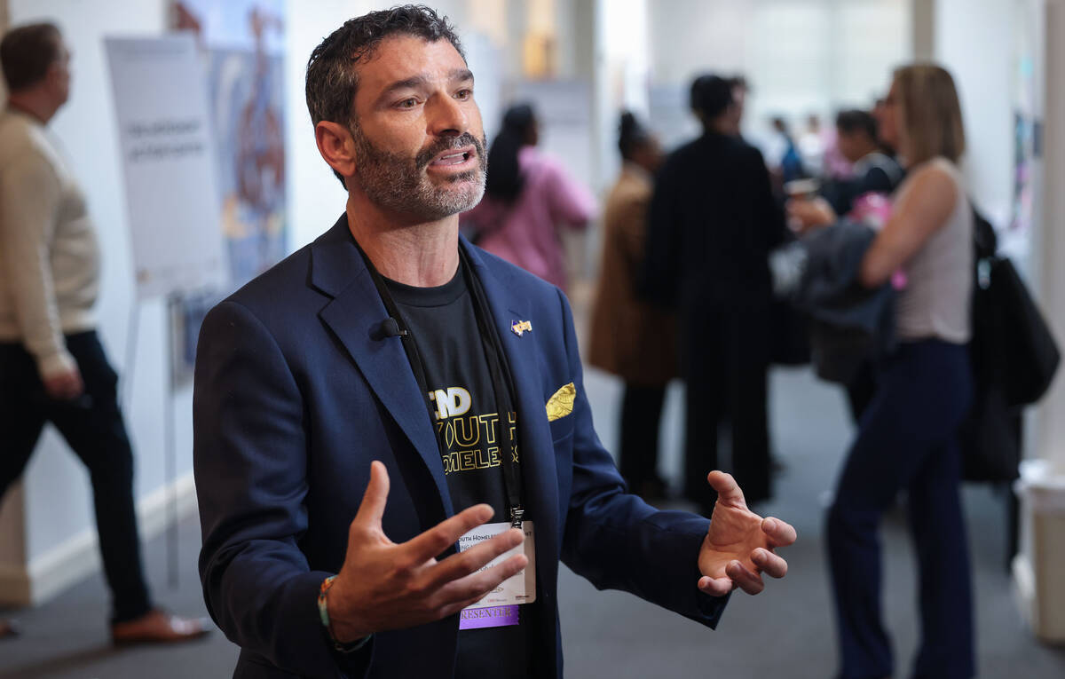 Arash Ghafoori, CEO of Nevada Partnership for Homeless Youth, speaks to the media during NPHY&# ...