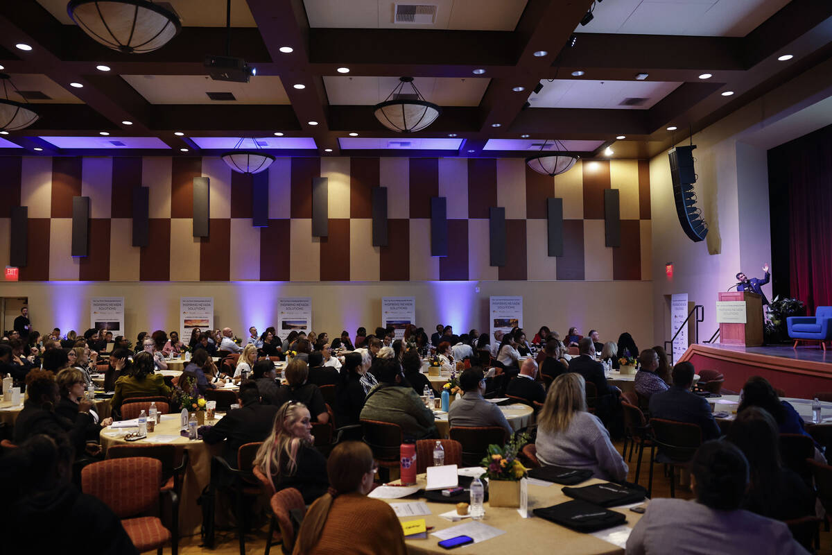 Arash Ghafoori, top/right, CEO of Nevada Partnership for Homeless Youth, speaks during NPHY ...