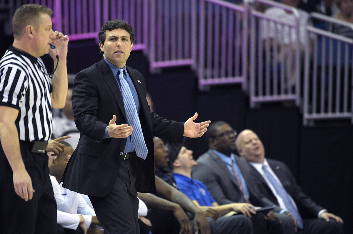 Memphis head coach Josh Pastner reacts on the sideline during the first half of an NCAA college ...