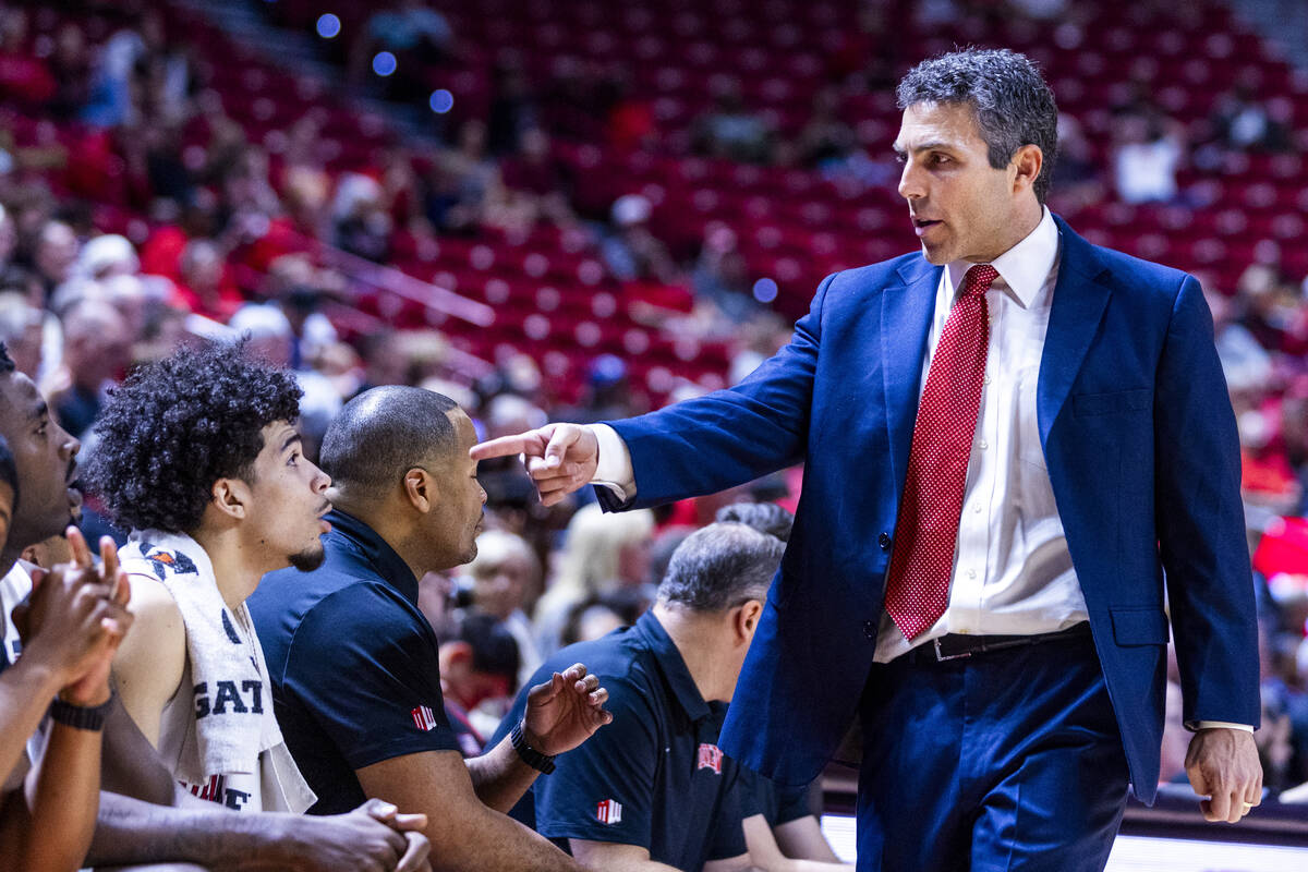 UNLV head coach Josh Pastner points to UNLV guard Al Green (7) on the bench against the UT Mart ...