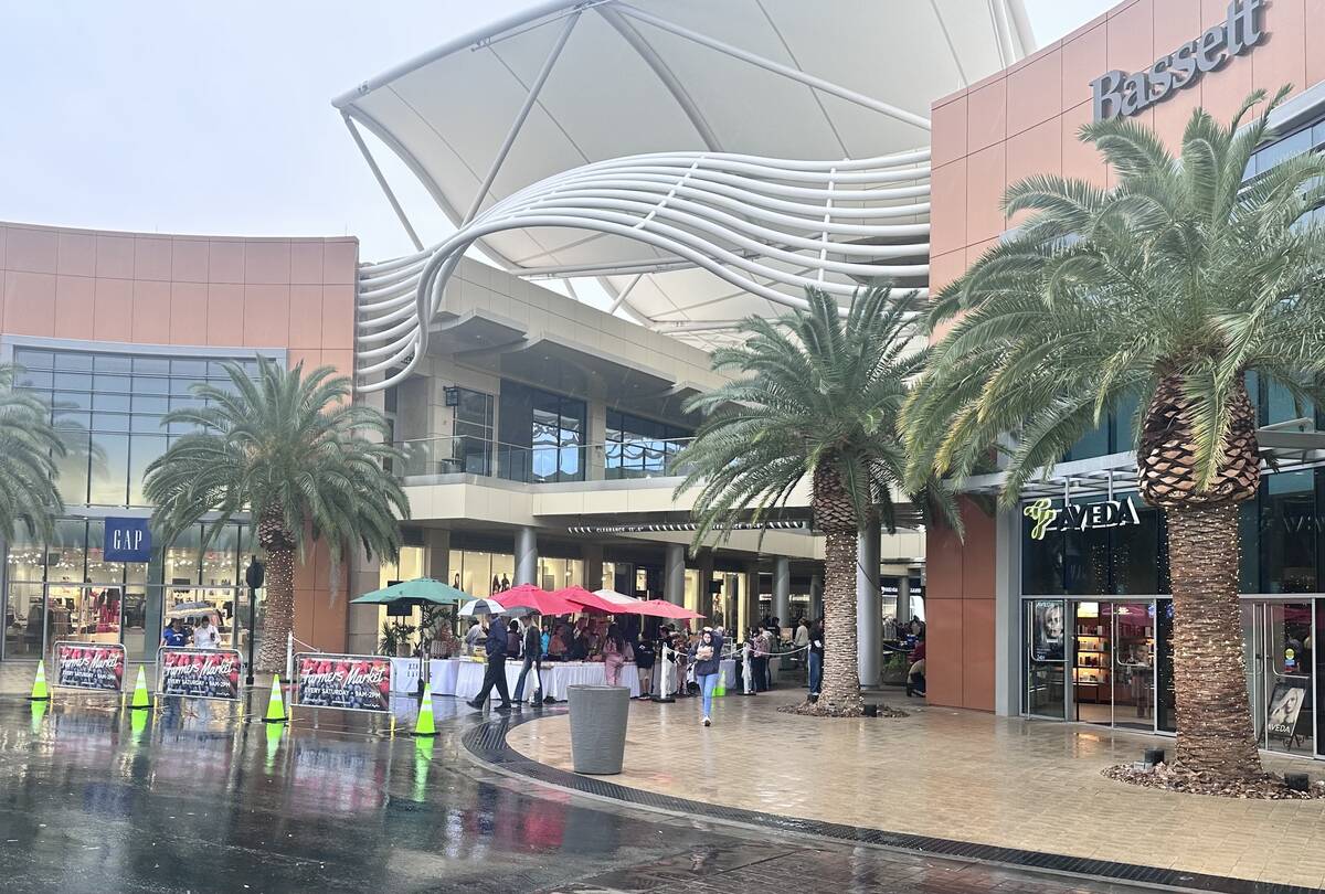 Rain did not stop shoppers from buying produce at the Farmers Market in Downtown Summerlin on S ...