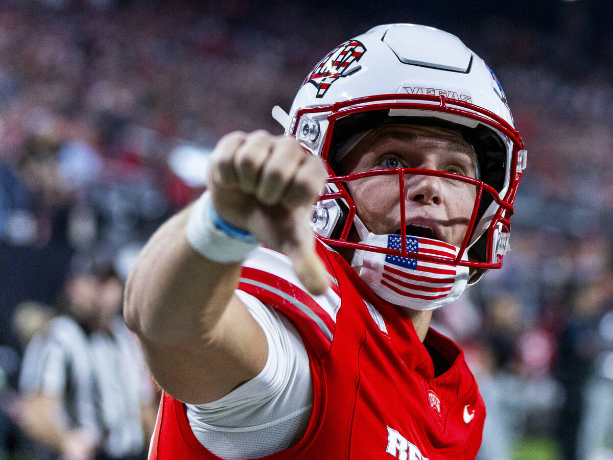 UNLV quarterback Anthony Colandrea (10) is unhappy with a touchdown overturned against Utah Sta ...
