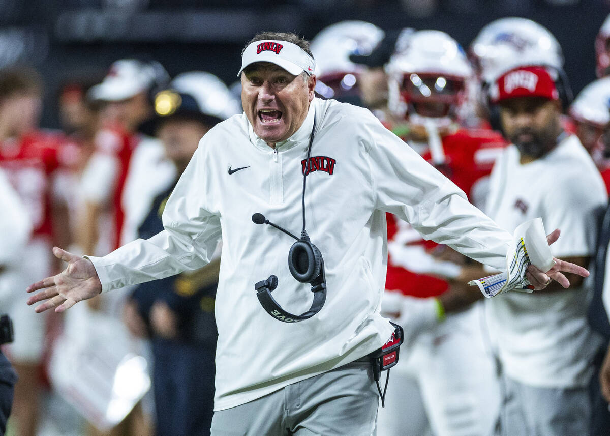 UNLV head coach Dan Mullen is frustrated by another questionable call in favor of Utah State du ...