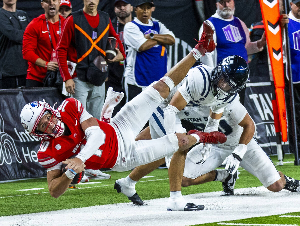 UNLV quarterback Anthony Colandrea (10) looks to the end zone after taken out on the sidelines ...