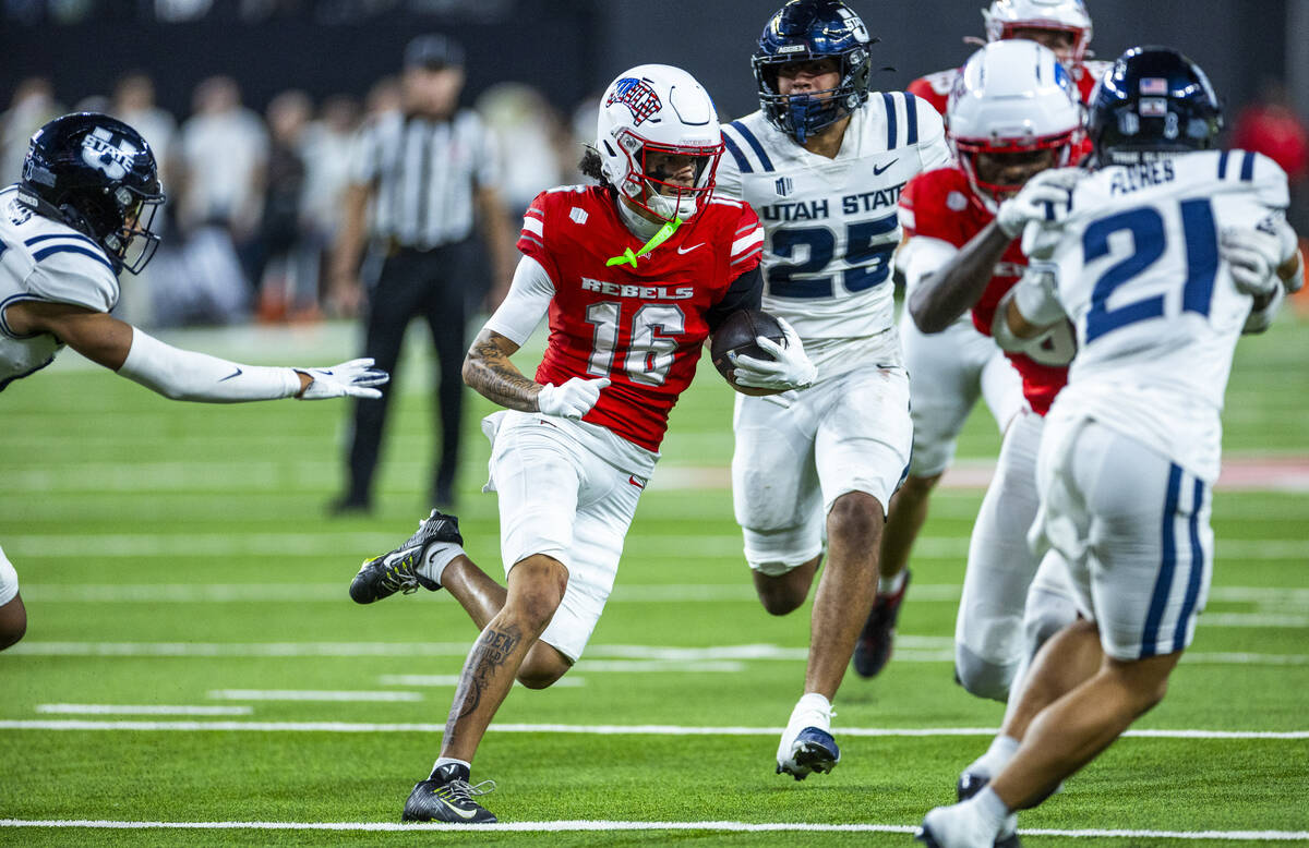 UNLV wide receiver Kayden McGee (16) cuts upfield on his way to scoring a touchdown for the win ...