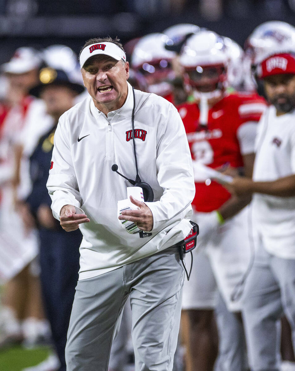 UNLV head coach Dan Mullen is incensed with the officials on another lack of penalty call on Ut ...
