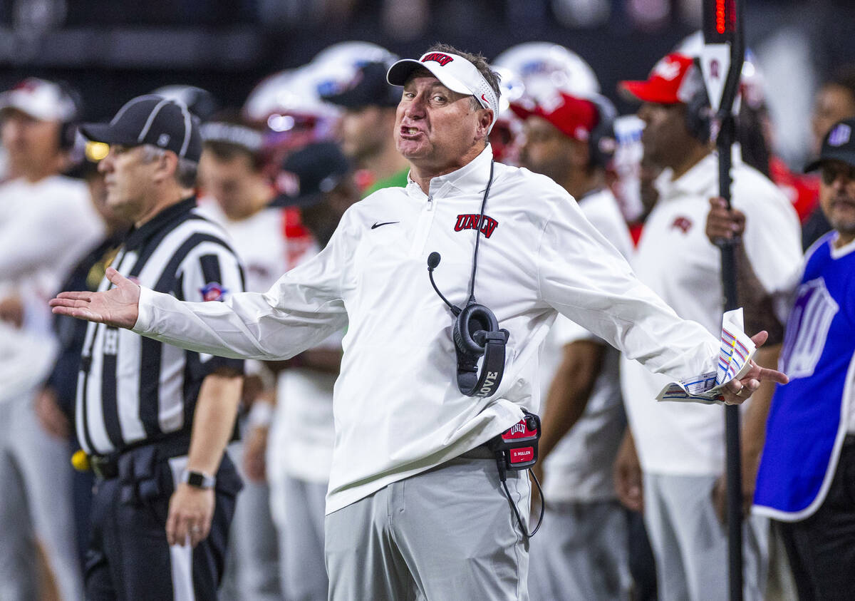 UNLV head coach Dan Mullen is incensed with the officials on another lack of penalty call on Ut ...