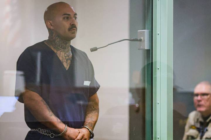 John Navarro stands for his initial appearance at the Las Vegas Justice Court Sunday, Nov. 16, ...