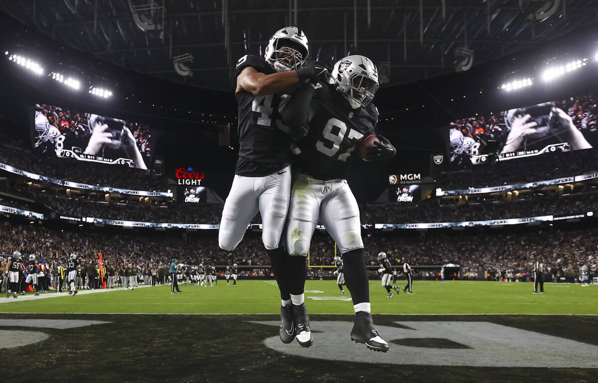 Raiders defensive tackle Tonka Hemingway (97) celebrates after recovering a fumble from the Dal ...