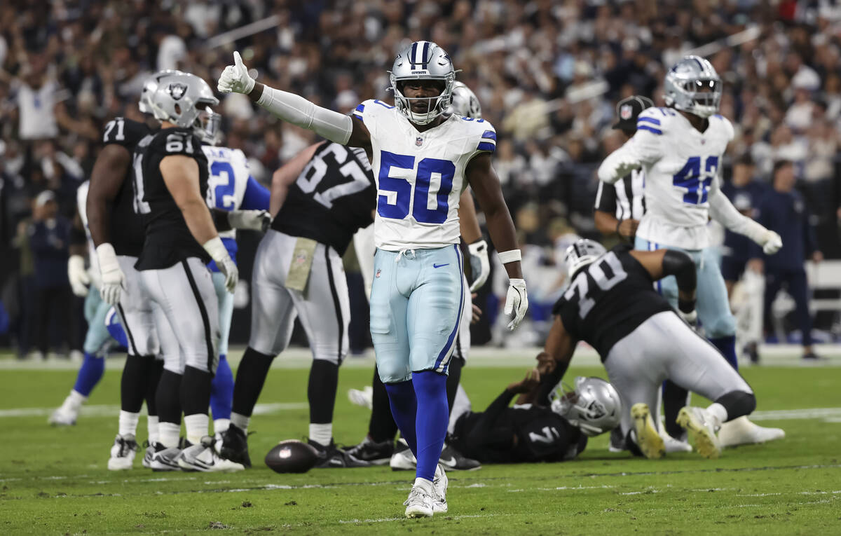 Dallas Cowboys linebacker Shemar James (50) reacts after the team sacked Raiders quarterback Ge ...