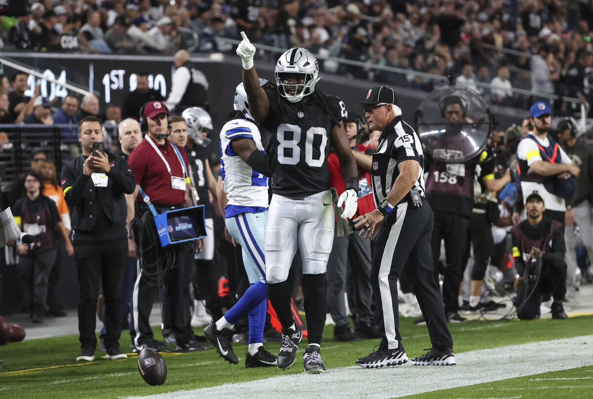 Raiders tight end Ian Thomas (80) reacts after a play against the Dallas Cowboys during the fir ...