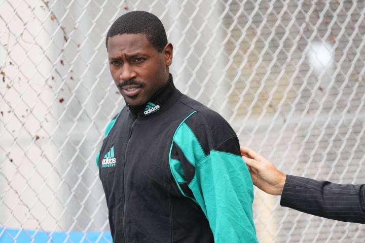Former NFL star wide receiver Antonio Brown walks after being released from the Turner Guilford ...