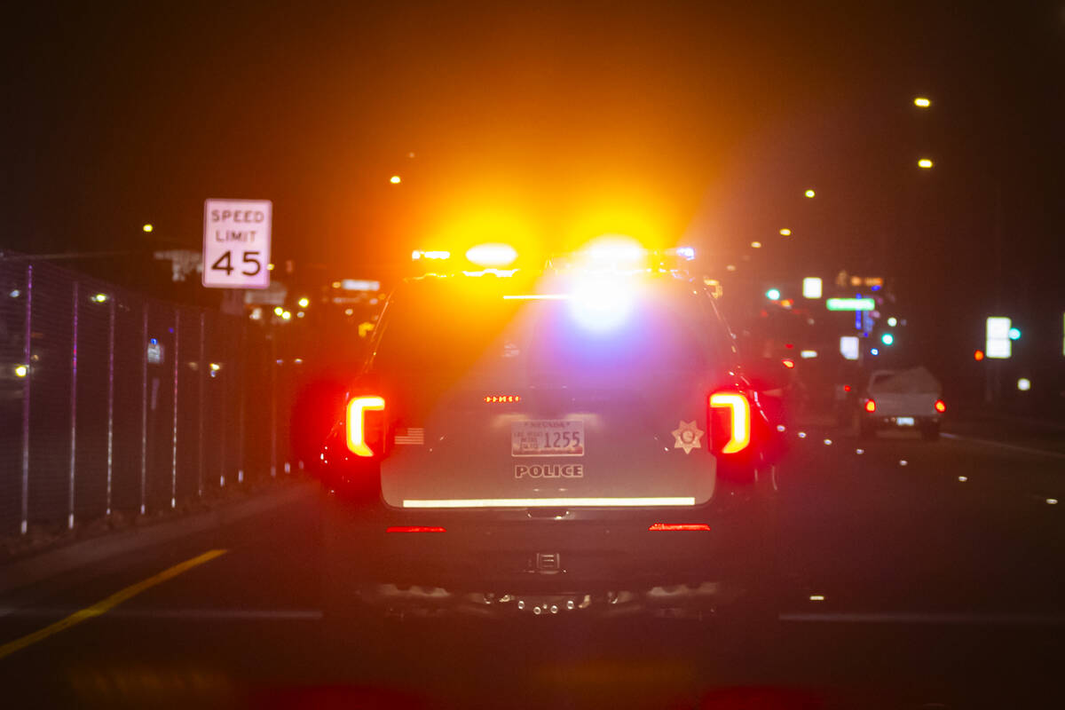 A Metropolitan Police Department officer with the Traffic Bureau makes a stop along Boulder Hig ...