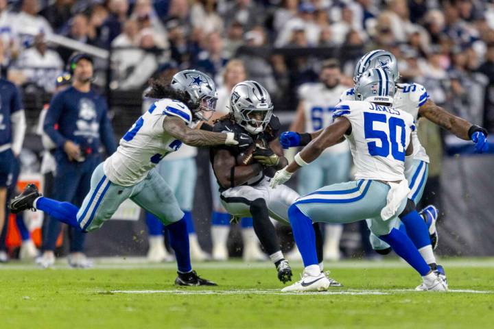 Dallas Cowboys linebacker Marist Liufau (35), defensive end Sam Williams (54) and linebacker Sh ...