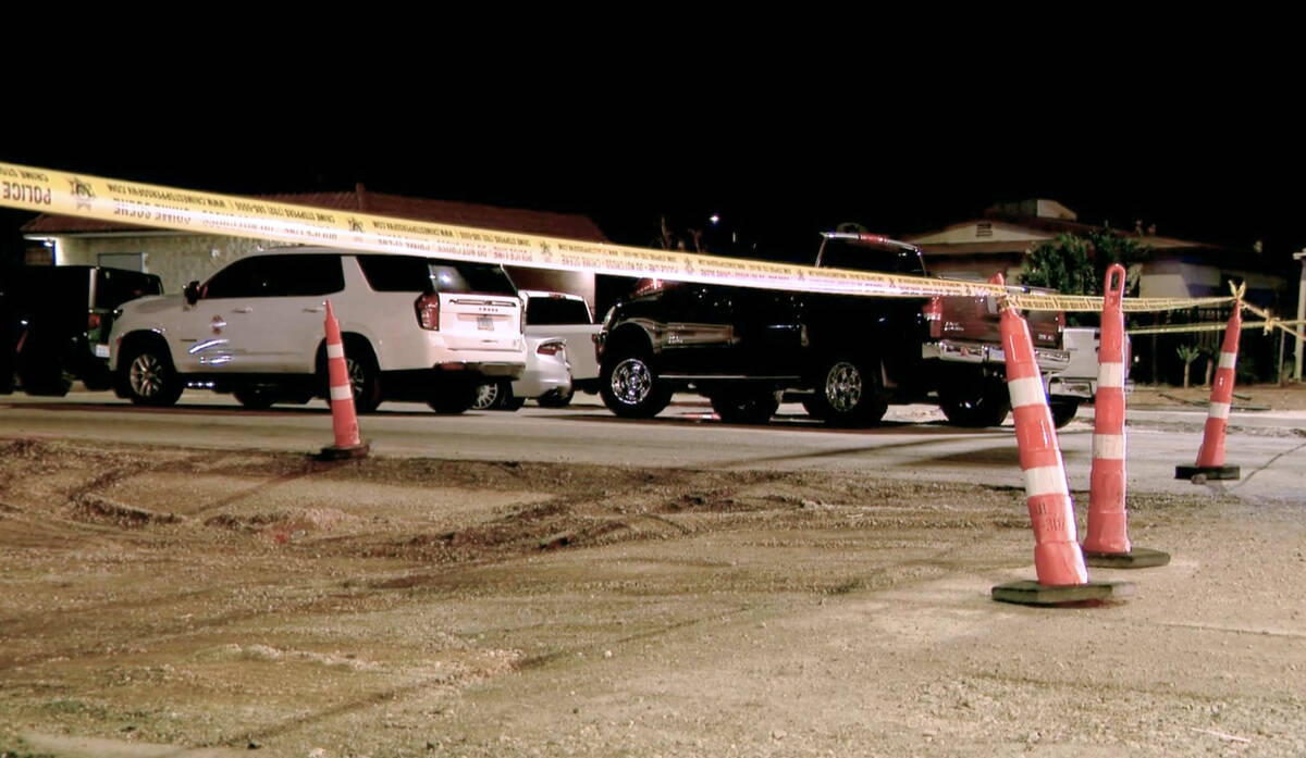 Las Vegas police investigate the scene of an accident where an 11-year-old girl was struck and ...