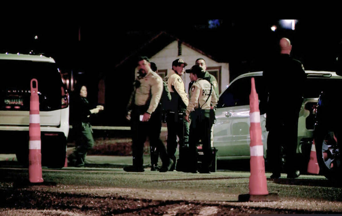 Las Vegas police investigate the scene of an accident where an 11-year-old girl was struck and ...