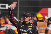 Red Bull driver Max Verstappen of the Netherlands waves after finishing third in the Formula On ...
