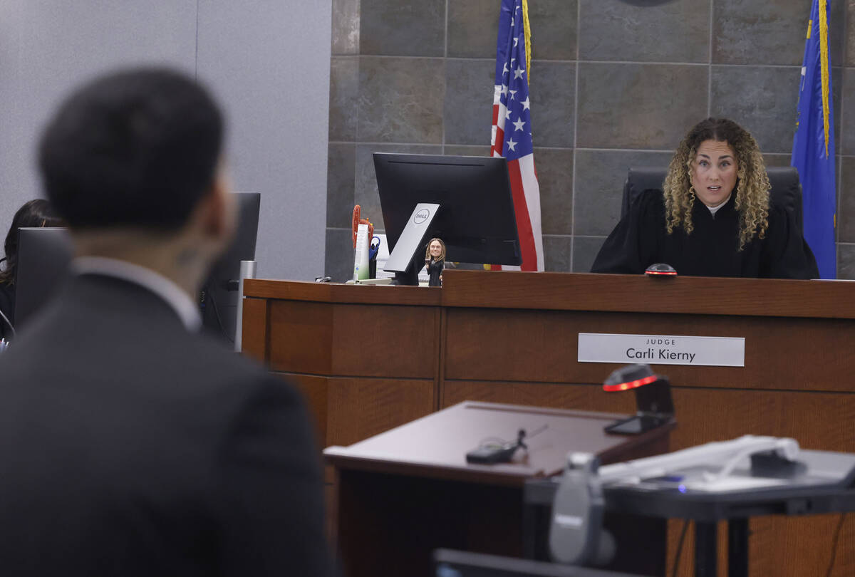 Gabriel Ayala, a teen who killed another teen as payback for a robbery, listens as District Jud ...