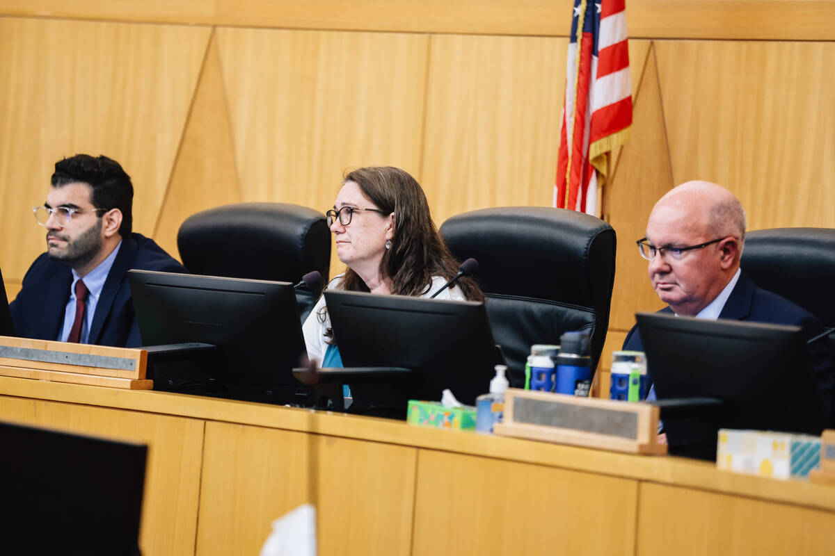 PUCN commissioners listen to public comment during a NV Energy consumer meeting at Clark County ...