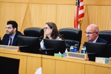 PUCN commissioners listen to public comment during a NV Energy consumer meeting at Clark County ...