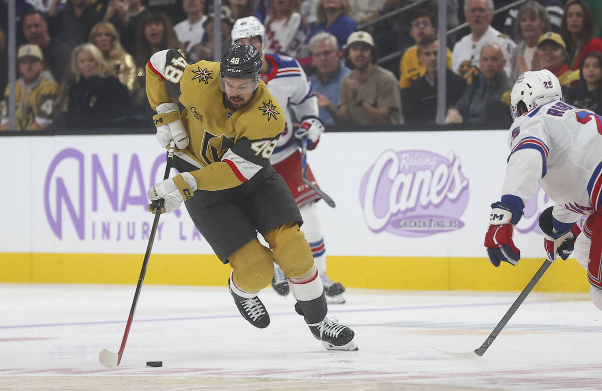 Golden Knights center Tomas Hertl (48) skates with the puck as New York Rangers defenseman Matt ...
