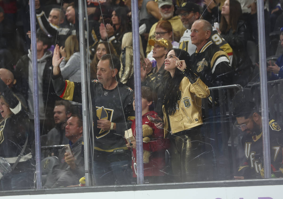 Golden Knights fans celebrate a goal against the New York Rangers during the first period of an ...