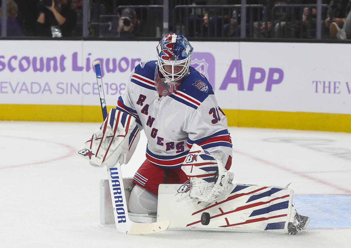New York Rangers goaltender Igor Shesterkin (31) blocks a shot from the Golden Knights during t ...