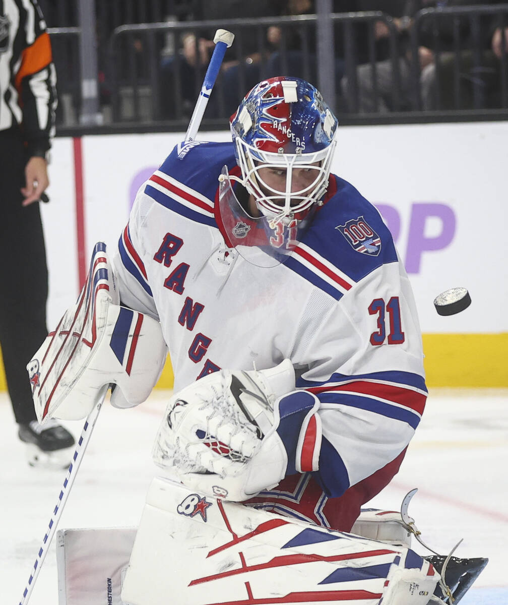 New York Rangers goaltender Igor Shesterkin (31) eyes the puck during the third period of an NH ...